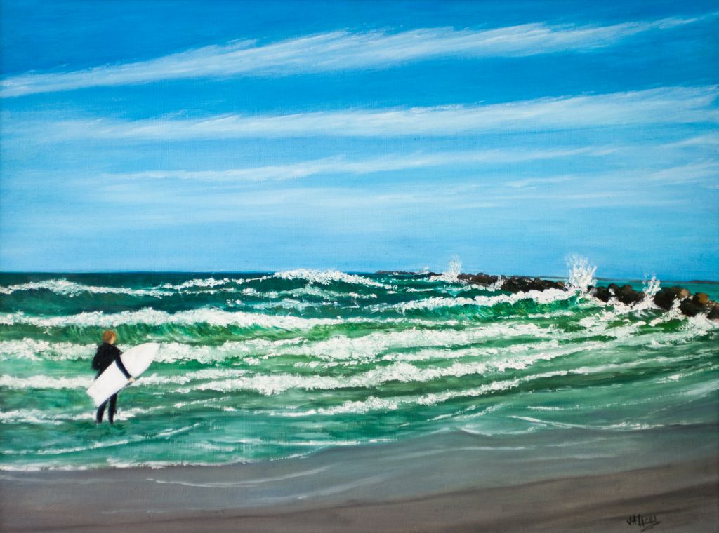 Surfer at Huguenot Park's north jetties.